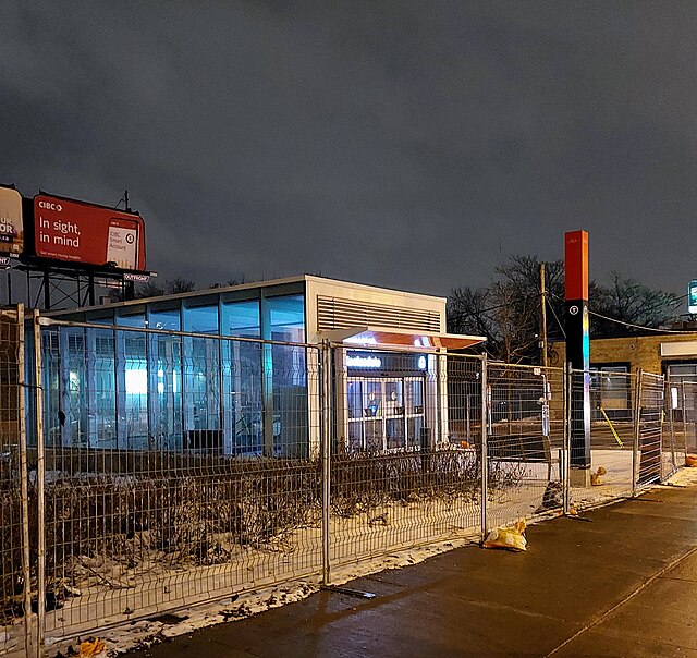 Photo of glass panelled subway station entrance