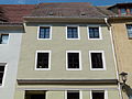 Residential house in closed development with a tower-like rear building