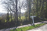 Miniatuur voor Bestand:Leaning signpost, Pett Rd and Peter James Lane junction - geograph.org.uk - 1854922.jpg
