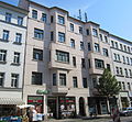 Eisenbahnstraße 71, Mietshaus in geschlossener Bebauung mit Läden; Putzfassade, eisernes Treppenhaus, ehemals Apothekeneinrichtung von 1932, ortsbaugeschichtlich bedeutsam, Eisentreppe und Apothekenausstattung mit Seltenheitswert