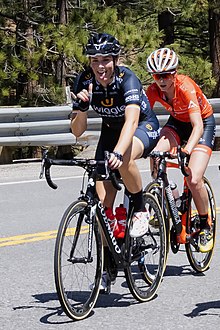 Macey Stewart of Wiggle High 5 gives the Hawaiian Shaka sign, also known as the Hang Loose sign on Kingsbury Grade on Stage 2 (41997731380).jpg