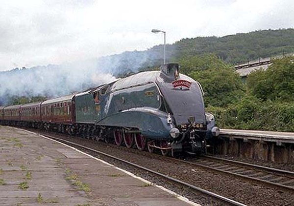 LNER Class A4 4468 Mallard traveling through Keighley in West Yorkshire in 1988