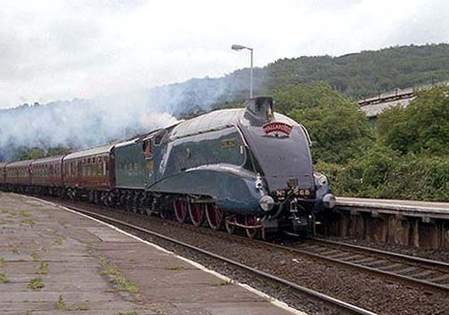 LNER Class A4 4468 Mallard traveling through Keighley in West Yorkshire in 1988