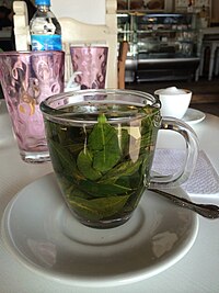 A cup of mate de coca served in a coffee shop in Cuzco, Peru Mate de Coca Cusco.jpg