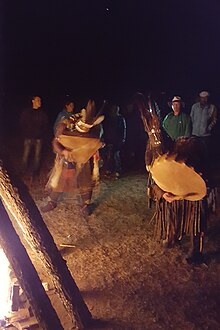 Mongol shamans in a "fire ritual" to celebrate the summer solstice (Ulaan Tergel) on the night of 21 June 2017 Mongol shamans at fire ritual (Ulaan Tergel) in steppes near Ulaanbaatar, 21 June 2017.jpg