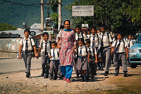 Nepalese teacher and schoolchildren in Pokhara