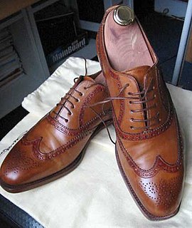 Brogue shoe Style of low-heeled shoe or boot decorated with perforations