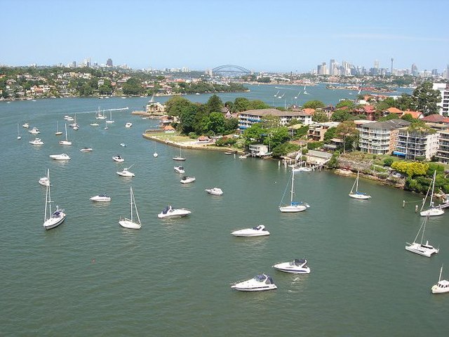 Bird's-eye view of the Parramatta River as it heads to Port Jackson, looking east towards Sydney CBD from Gladesville Bridge