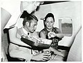 Passengers being served light refreshments on board a Boeing 737 jet. Wellington (26963738158).jpg