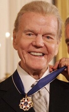 Harvey receiving the Presidential Medal of Freedom in 2005