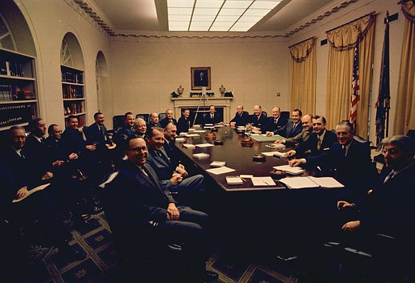 The Nixon cabinet poses for a photograph, days after Nixon's inauguration as president. Hickel is slightly left of center.