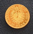 Német, porosz 1880-as 10 márkás aranyérme közös hátoldala, a birodalmi címer első változatával, előoldalán I. Vilmos német császár és porosz király portréja szerepelt.