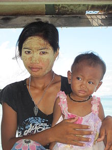 The Sinama speakers of Semporna, Malaysia are known as Bajau.  This Bajau woman wears borak the traditional sun protection.