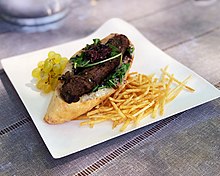 A hot dog made from lamb in Sonoma, California Sigh and Elaine Bell Catering Pop-Up, Sonoma, California 07.jpg