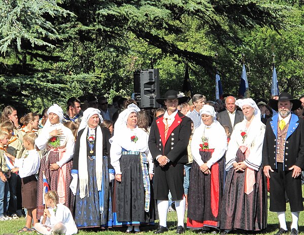 Traditional Karst folk costumes in a Slovenian commemorative celebration in Basovizza near Trieste