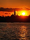 Saint-Jean and the Saint-Jean-l'Evangeliste church at sunset