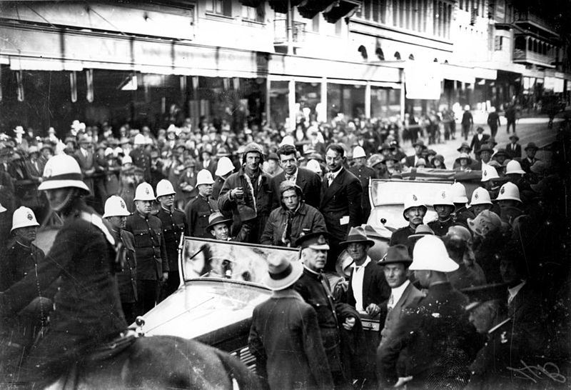 File:StateLibQld 2 145503 People lined up along a Brisbane street to see Sir Charles Kingsford Smith, 1928.jpg