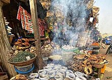 A market shop in Anambra State, Nigeria Steamed Fish and Food Stuffs - The Market Shop.jpg