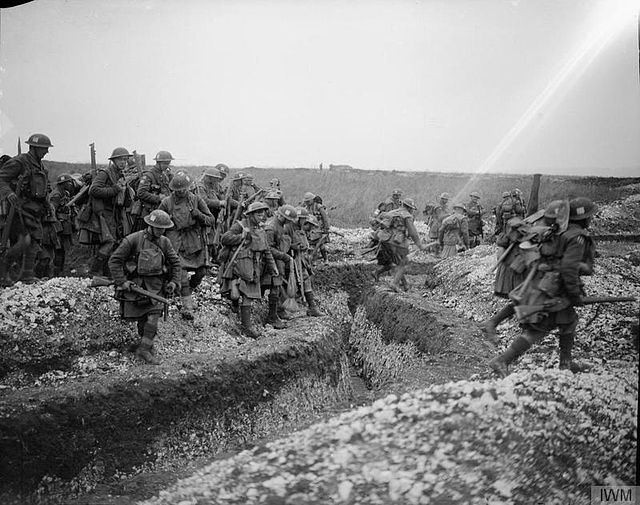 Men of the 1/4th Battalion, Gordon Highlanders, crossing a trench, Ribecourt, France, 20 November 1917.