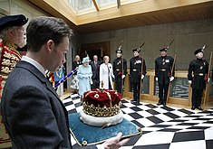 Elizabeth II opening the Scottish Parliament, with Alexander Douglas-Hamilton, 16th Duke of Hamilton, traditionally carrying the Crown of Scotland (2011)