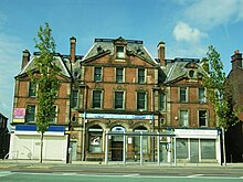 The branch in Wicker in French Second Empire style of 1893 by Flockton & Gibbs The former Sheffield and Hallamshire Bank, Wicker, Sheffield - geograph.org.uk - 1490434.jpg