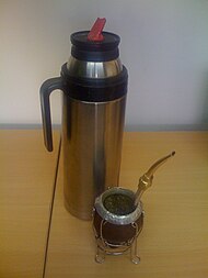 The invigorating yerba mate in its gourd with thermos. It is a fixture in Uruguayan daily life. TipicoMateUruguayo.jpg