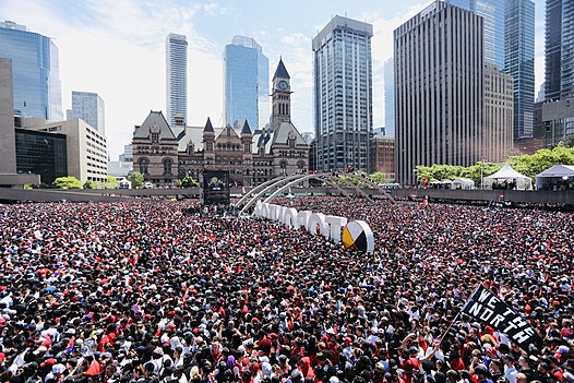 Toronto's Nathan Phillips Square on June 17, 2019 with crowds surrounding the Toronto Sign during the victory parade