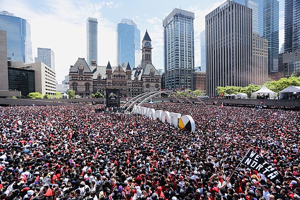 Toronto's Nathan Phillips Square on June 17, 2019, with crowds surrounding the Toronto Sign during the victory parade