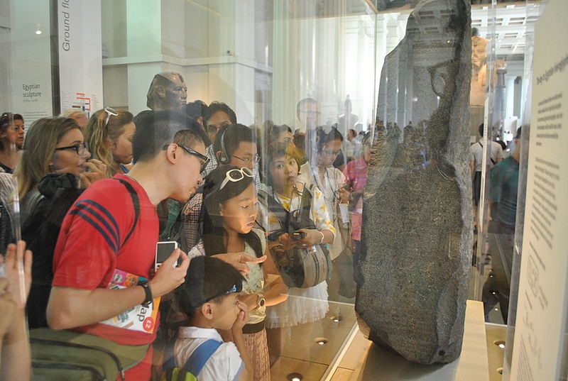 File:Tourist watching Rosetta Stone at British Museum.JPG