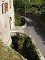 On the side of the house below the church of San Bartolomeo