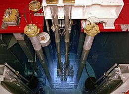 Cherenkov radiation glowing in the core of a TRIGA reactor. TrigaReactorCore.jpeg