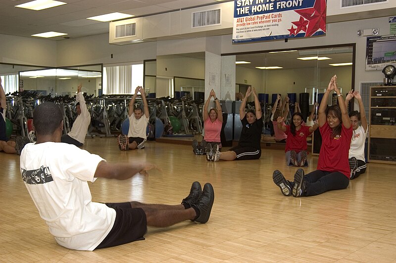 File:US Navy 070327-N-6674H-003 Members of Commander, Navy Region Hawaii's Morale, Welfare and Recreation (MWR) fitness staff practice alphabet stretches, an exercise designed for children to make fitness fun.jpg