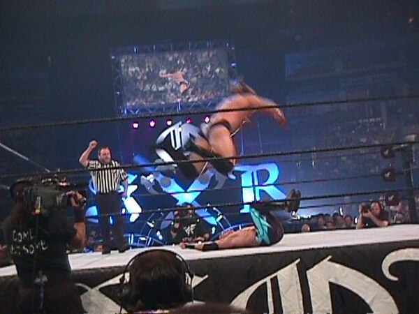 Guerrero (bottom) facing Val Venis at King of the Ring in June 2000
