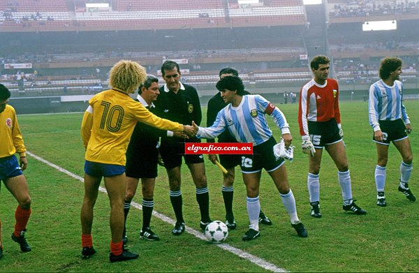 Carlos Valderrama and Diego Maradona greeting before the Argentina v Colombia match in 1987