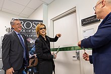 Japanese musician Yoshiki cuts the ribbon outside the newly established Yoshiki Dean's Suite at the Frost School of Music in June 2019 Yoshiki Frost School of Music-10.jpg