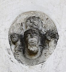 Carving on north church wall