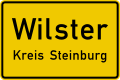 Town sign: Start of urban area (50 km/h speed limit)