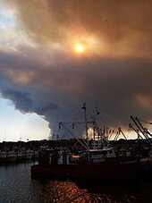 The smoke column from the Warren Grove Fire seen from several miles away in the harbor of Barnegat Light, New Jersey on May 15, 2007 2007 05 15 - Barnegat Light - Pine Barrens Forest Fire 3.jpg