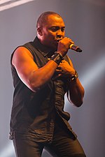 Trinidadian-German Eurodance artist Haddaway achieved two top 10 singles in 1993, including his signature song, "What is Love", which lasted nine weeks in the top 10, peaking at number two. 2014333223156 2014-11-29 Sunshine Live - Die 90er Live on Stage - Sven - 1D X - 0674 - DV3P5673 mod.jpg