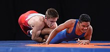 Carson Lee vs. Valentine Yairegpie 2018-10-14 Lee vs Yairegpie (Group stage Boys Wrestling Freestyle 80kg) at 2018 Summer Youth Olympics by Sandro Halank-017.jpg