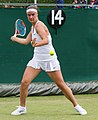 Anhelina Kalinina competing in the first round of the 2015 Wimbledon Qualifying Tournament at the Bank of England Sports Grounds in Roehampton, England. The winners of three rounds of competition qualify for the main draw of Wimbledon the following week.