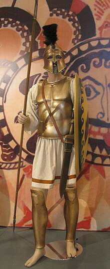 A Greek hoplite with muscle cuirass, spear, shield, Corinthian helmet and sheathed sword. Athenian hoplite.jpg