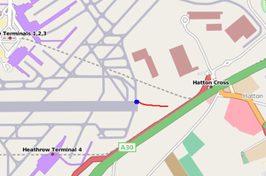 A map showing the location of the plane (blue dot) after landing and sliding through the field on the runway safety area – route marked in red