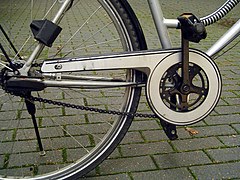 Partially enclosed chain on a European city bike