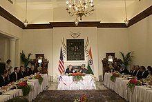 U.S. President George W. Bush and Indian Prime Minister Manmohan Singh during a meeting with Indian and American business leaders in New Delhi in March 2006 Bush Manmohan Singh CEO Meeting.jpg