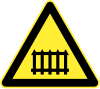 Railroad ahead (with safety barriers)