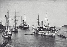 Dutch ships in Gorontalo. Gorontalo was an important trading hub during the colonial era. COLLECTIE TROPENMUSEUM Schepen in de Baai van Gorontalo TMnr 60039475.jpg