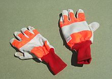 Chainsaw gloves. Only the back of the left hand glove contains chainsaw protective fabric, and so only that glove carries the chainsaw label. Chainsaw gloves.JPG