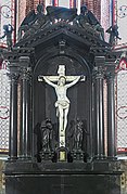   Altar and altarpiece, in black marble, by Alessandro Vittoria