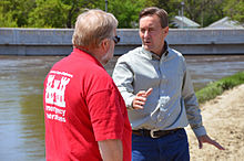 Congressman Rick Berg talks with Roland Hamborg, U.S. Army Corps of Engineers, June 4 in Minot Congressman speaks to USACE Souris River area flood engineer.jpg